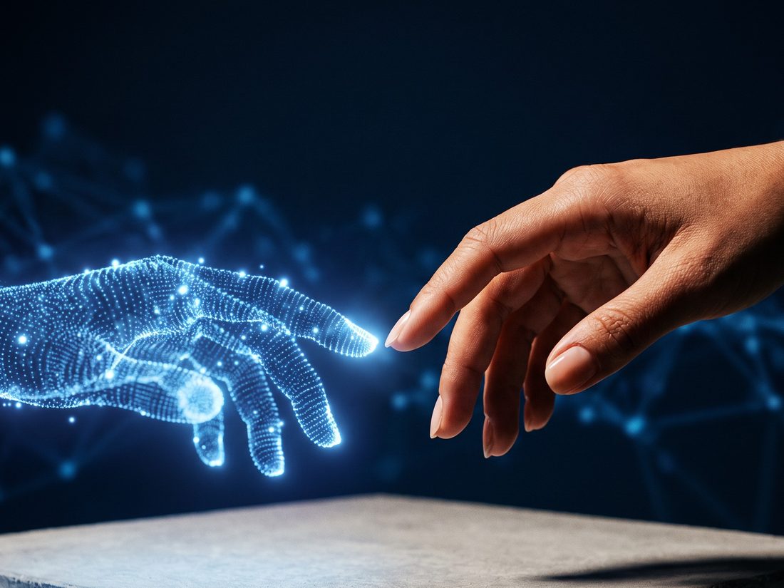 A human hand and a digital hand made of blue light reaching toward each other, representing people at the center of AI